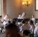 U.S. Navy Band Brass Quintet performs at the New York Athletic Club