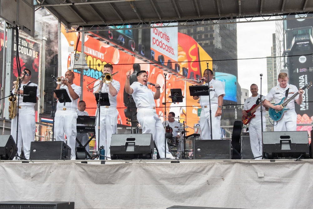U.S. Navy Band Cruisers perform on Times Square for the International Naval Review.