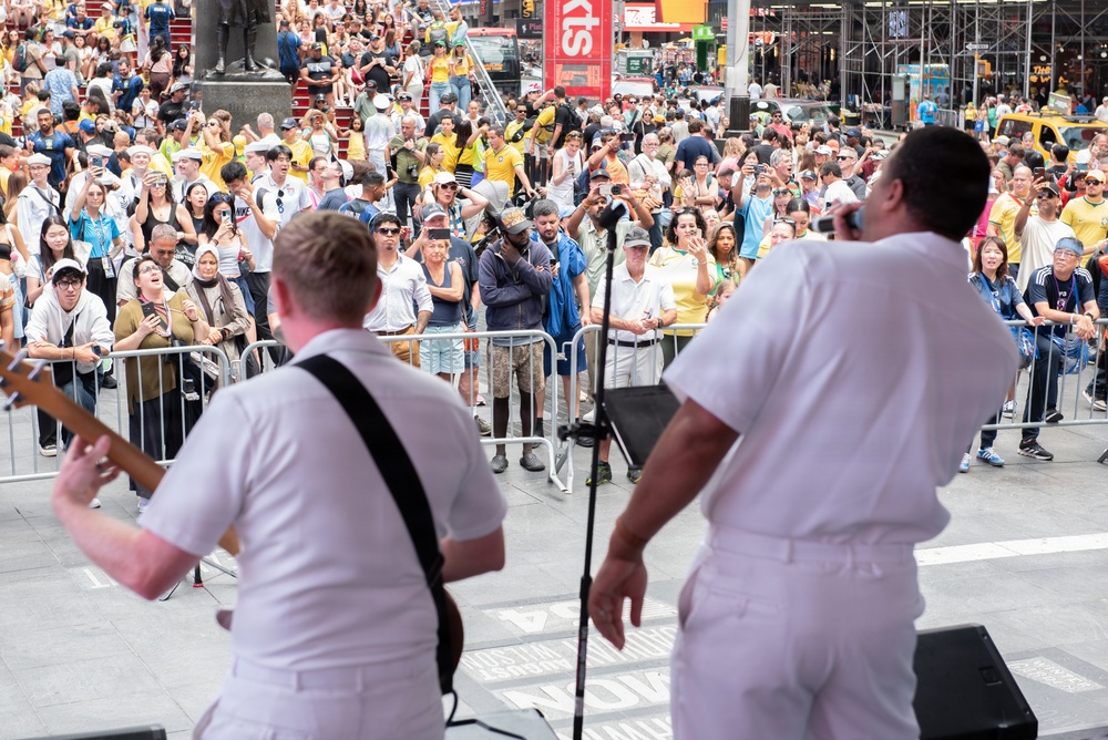 U.S. Navy Band Cruisers perform on Times Square for the International Naval Review.