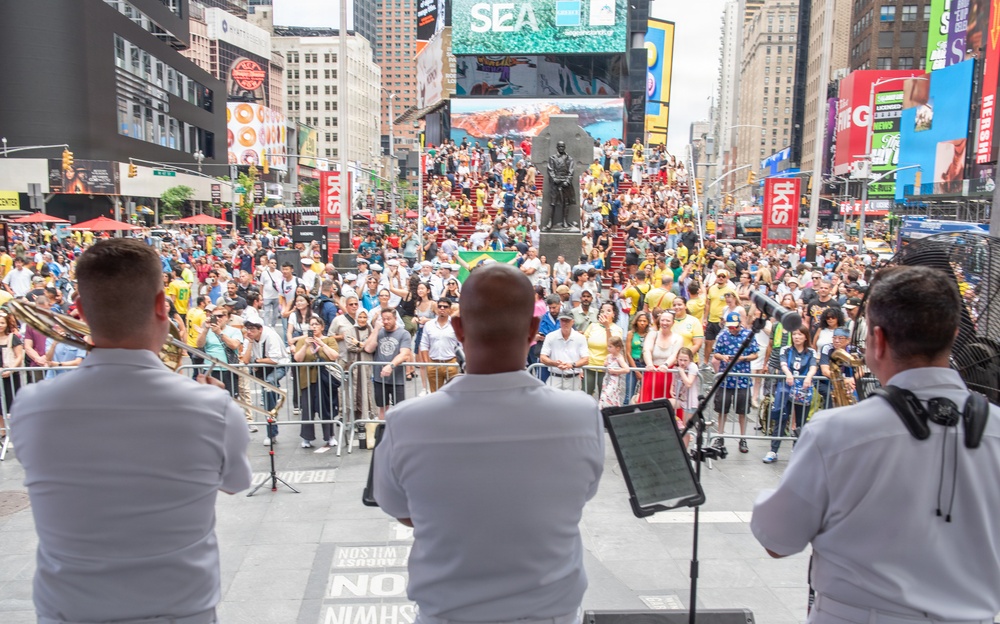 U.S. Navy Band Cruisers perform on Times Square for the International Naval Review.