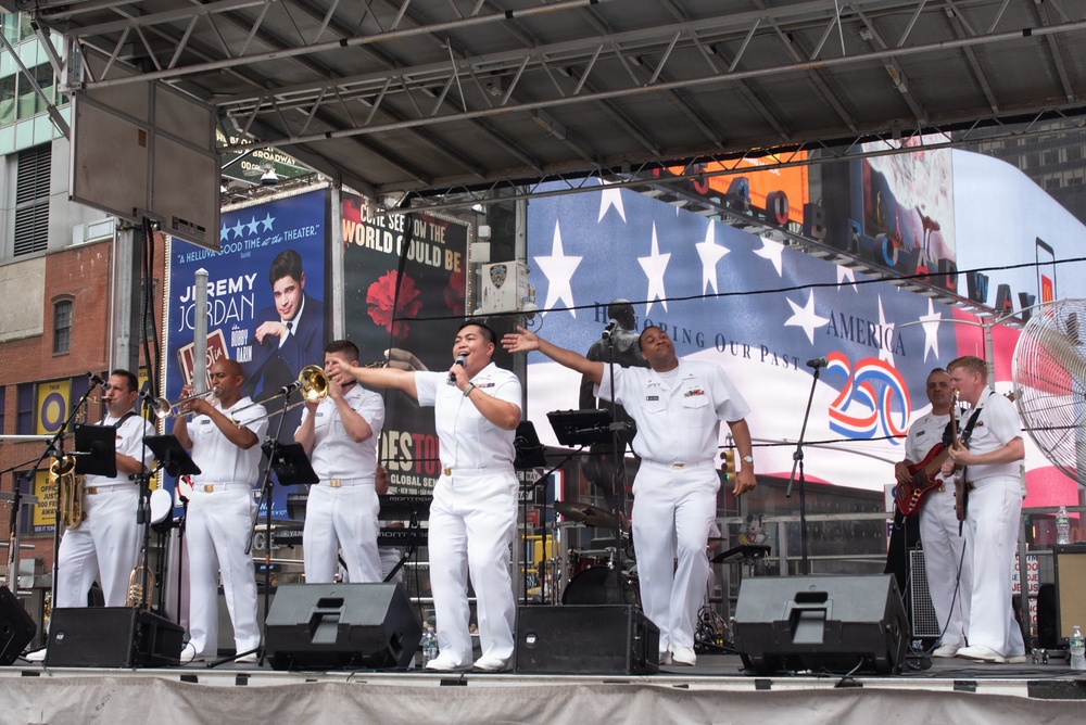 U.S. Navy Band Cruisers perform on Times Square for the International Naval Review.