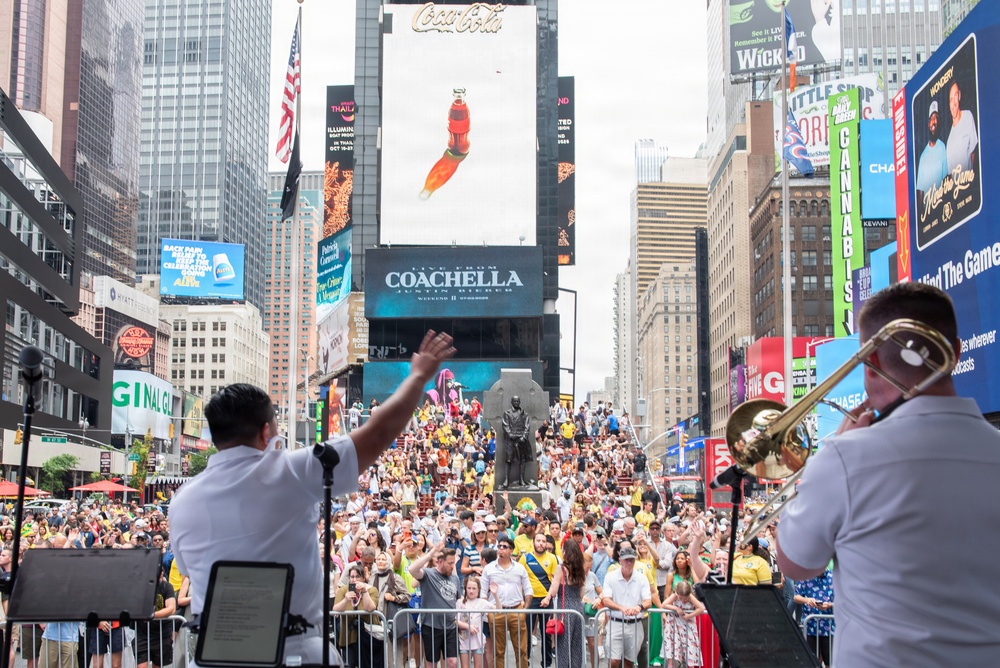 U.S. Navy Band Cruisers perform on Times Square for the International Naval Review.