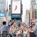 U.S. Navy Band Cruisers perform on Times Square for the International Naval Review.
