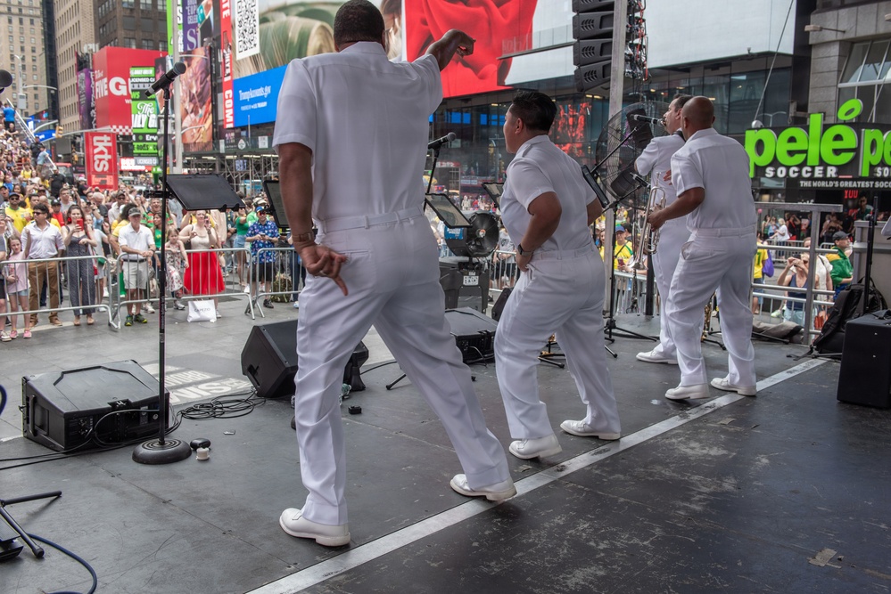 U.S. Navy Band Cruisers perform on Times Square for the International Naval Review.