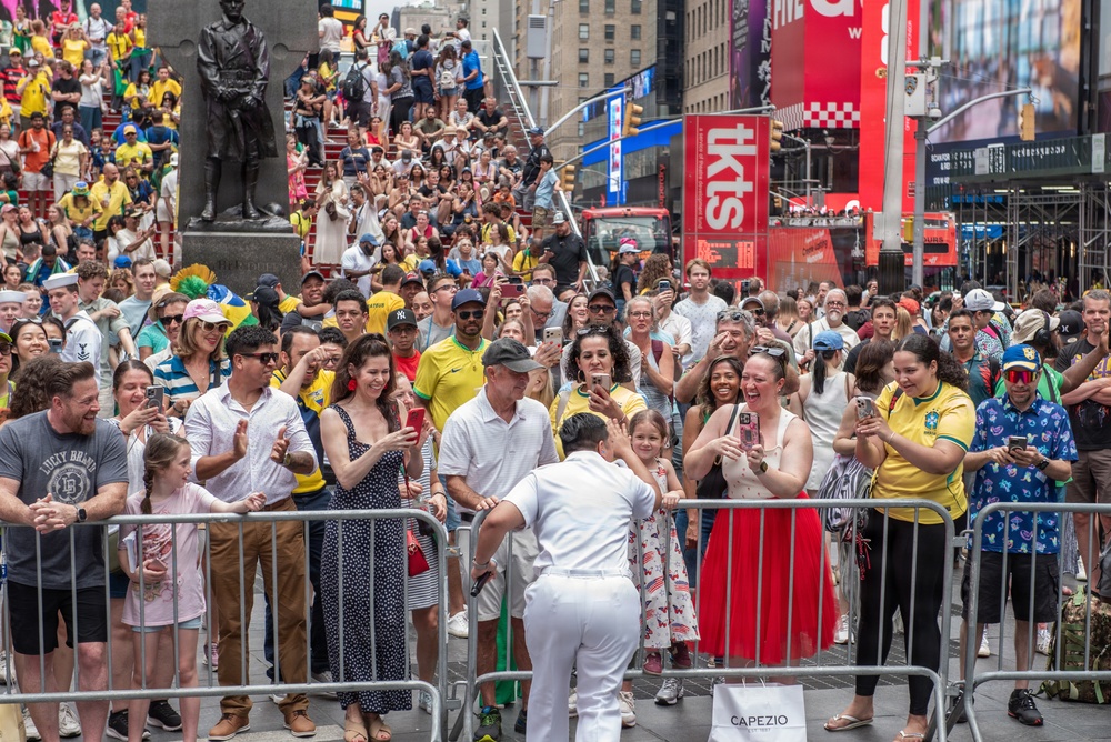U.S. Navy Band Cruisers perform on Times Square for the International Naval Review.