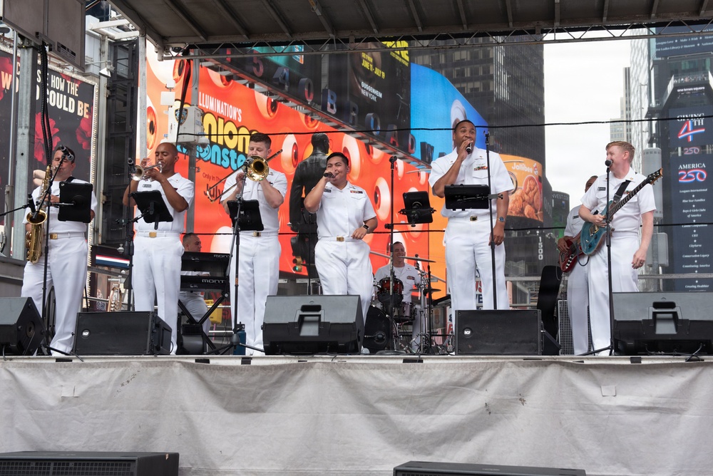 U.S. Navy Band Cruisers perform on Times Square for the International Naval Review.