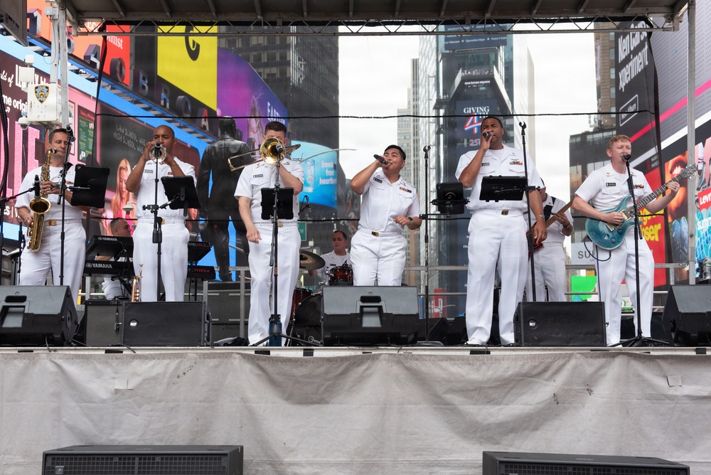 U.S. Navy Band Cruisers perform on Times Square for the International Naval Review.