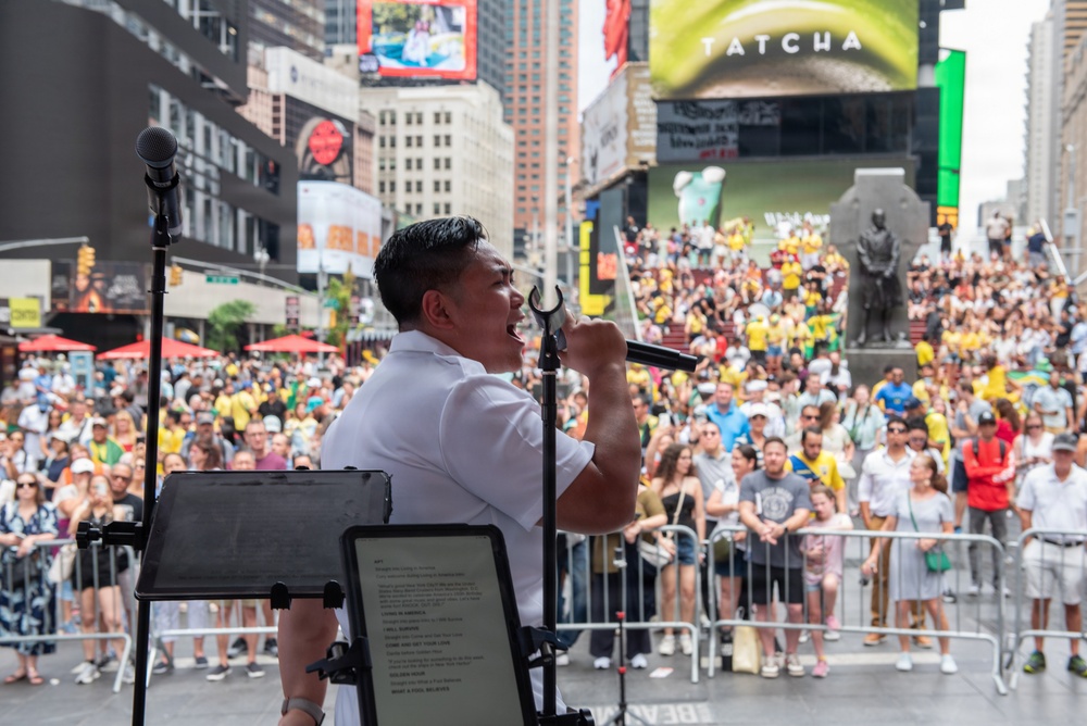 U.S. Navy Band Cruisers perform on Times Square for the International Naval Review.