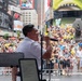 U.S. Navy Band Cruisers perform on Times Square for the International Naval Review.