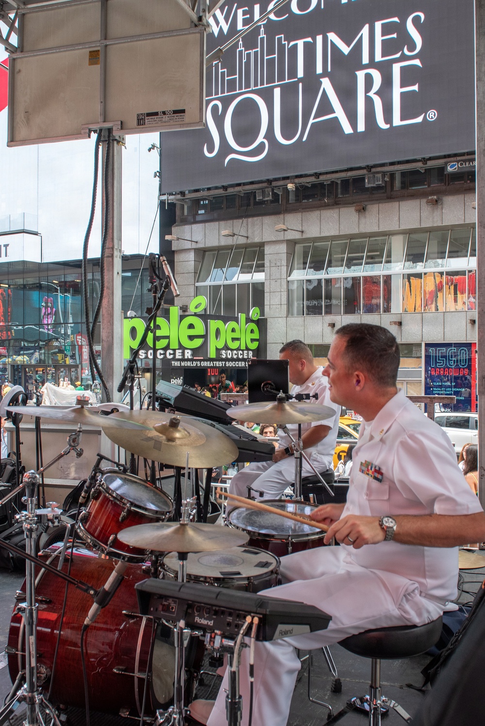 U.S. Navy Band Cruisers perform on Times Square for the International Naval Review.