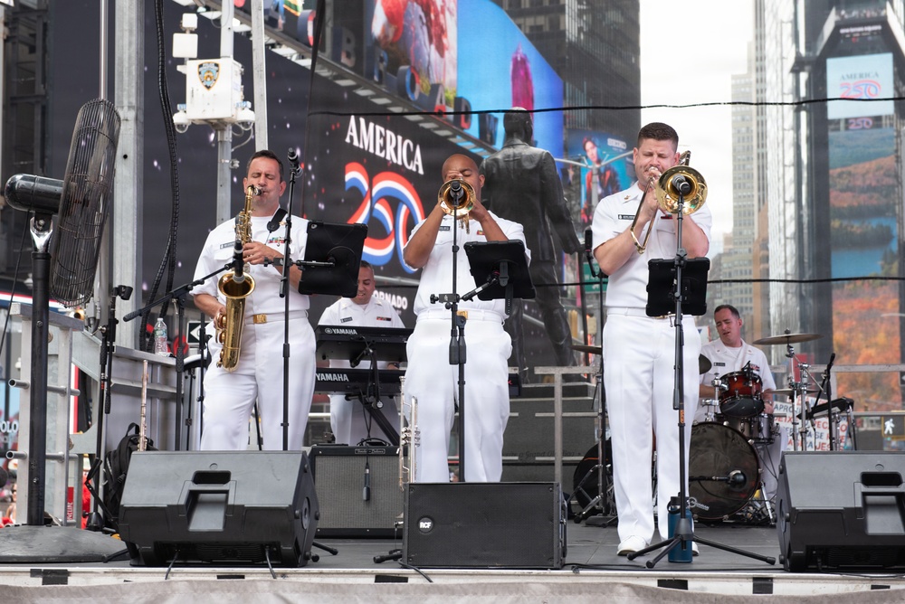 U.S. Navy Band Cruisers perform on Times Square for the International Naval Review.