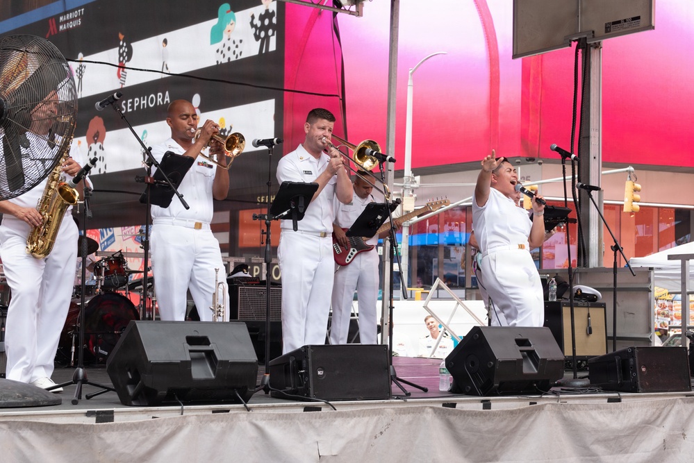 U.S. Navy Band Cruisers perform on Times Square for the International Naval Review.