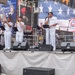 U.S. Navy Band Cruisers perform on Times Square for the International Naval Review.
