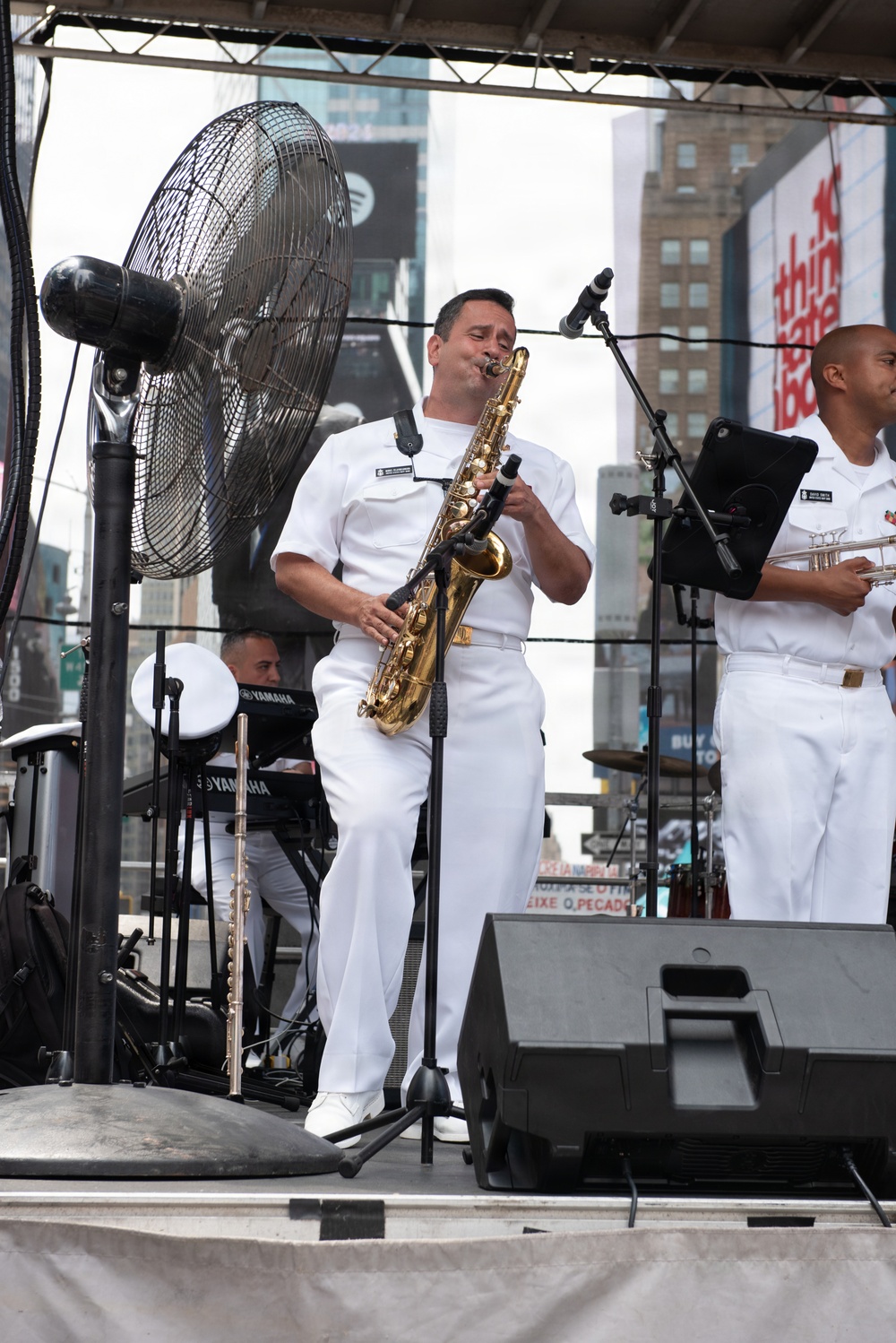 U.S. Navy Band Cruisers perform on Times Square for the International Naval Review.