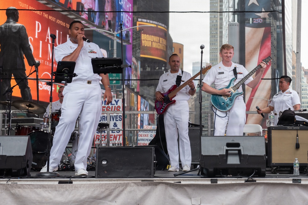U.S. Navy Band Cruisers perform on Times Square for the International Naval Review.