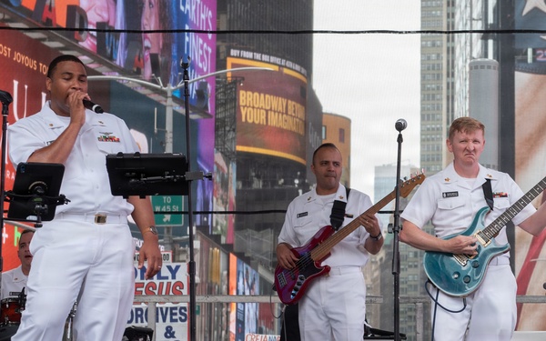 U.S. Navy Band Cruisers perform on Times Square for the International Naval Review.