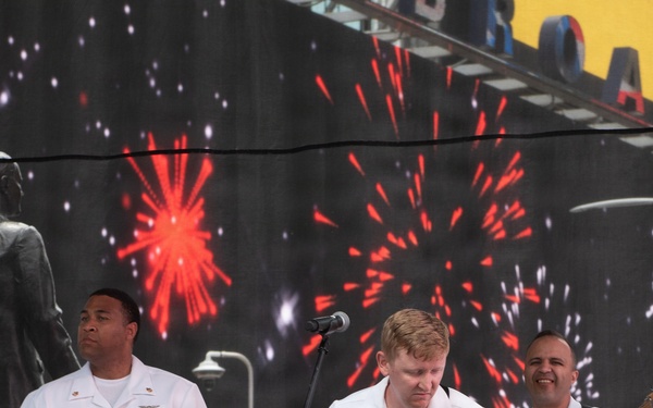 U.S. Navy Band Cruisers perform on Times Square for the International Naval Review.