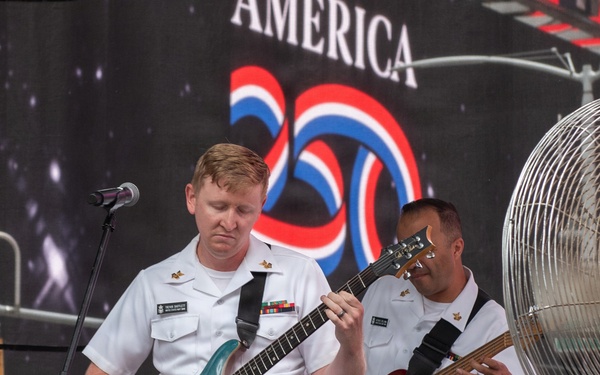 U.S. Navy Band Cruisers perform on Times Square for the International Naval Review.