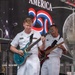 U.S. Navy Band Cruisers perform on Times Square for the International Naval Review.