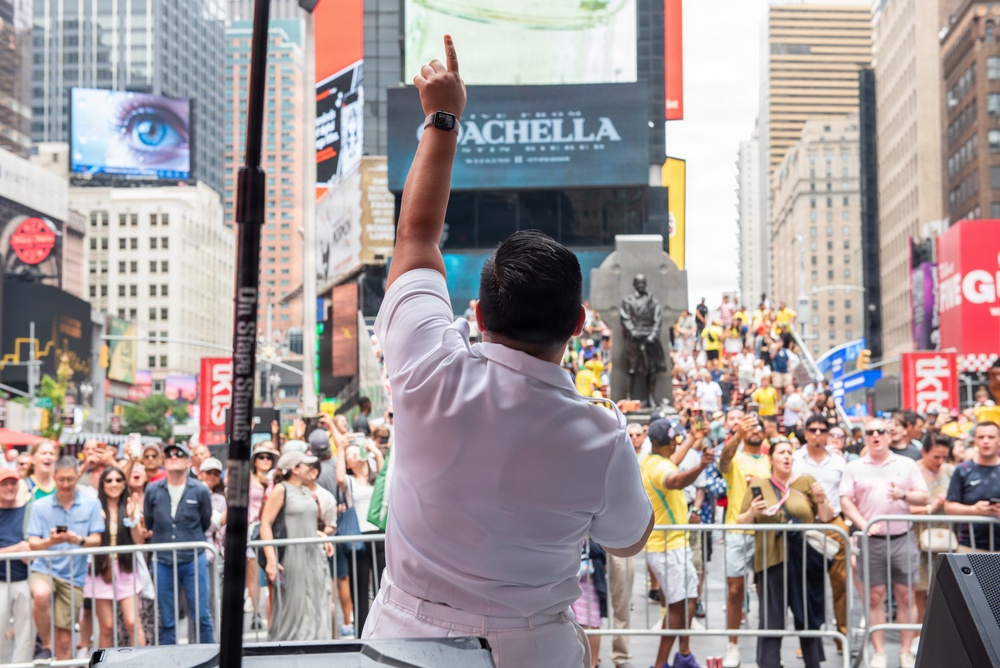 U.S. Navy Band Cruisers perform on Times Square for the International Naval Review.