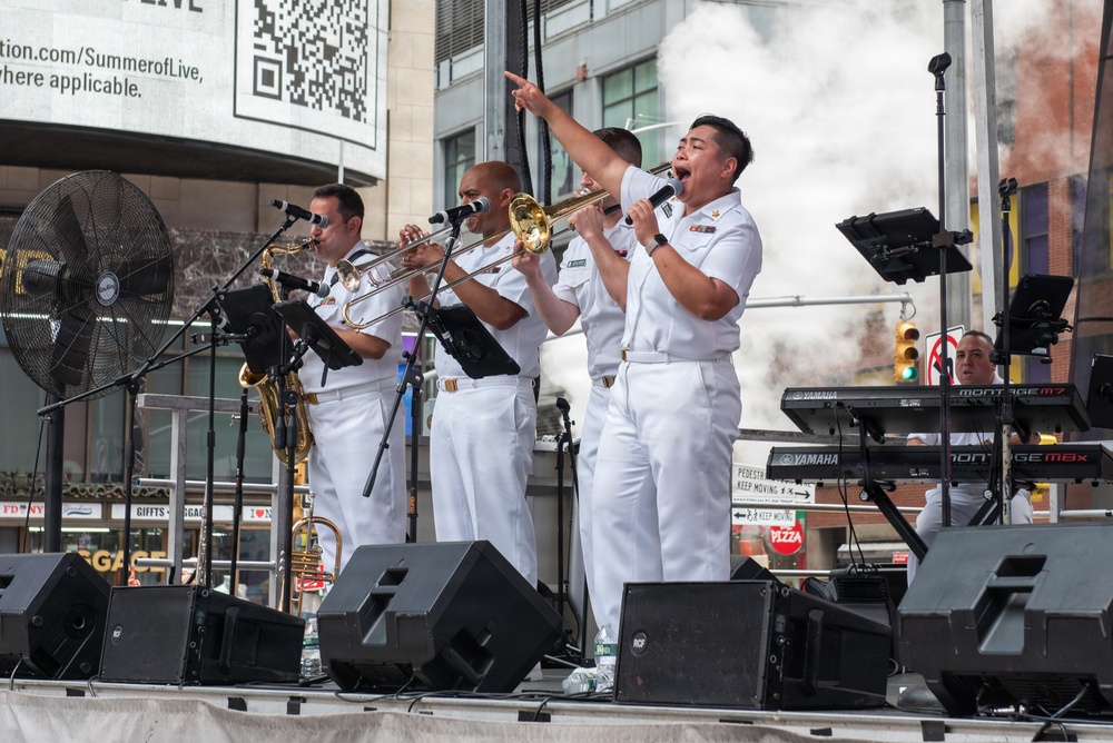U.S. Navy Band Cruisers perform on Times Square for the International Naval Review.