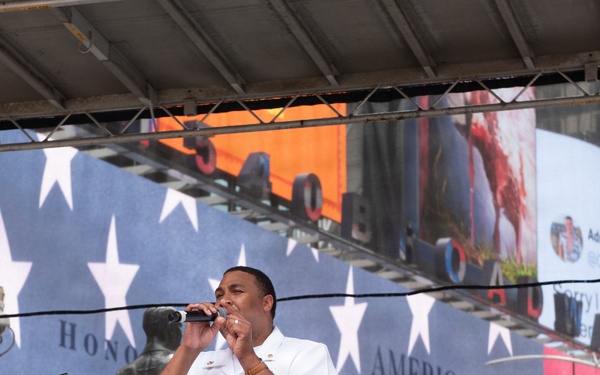 U.S. Navy Band Cruisers perform on Times Square for the International Naval Review.