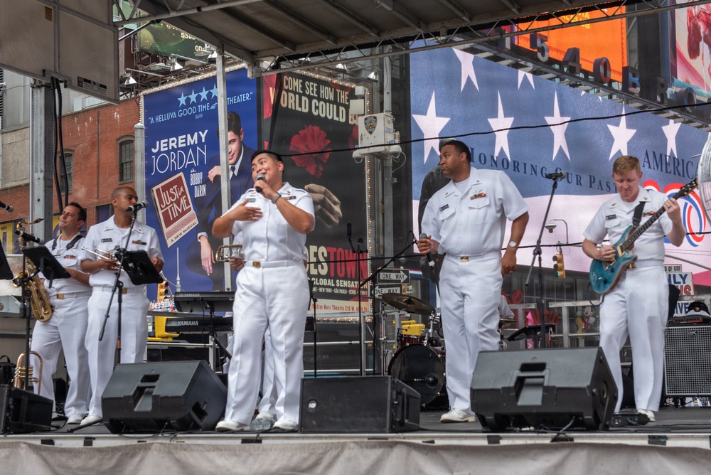U.S. Navy Band Cruisers perform on Times Square for the International Naval Review.