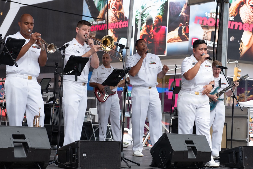 U.S. Navy Band Cruisers perform on Times Square for the International Naval Review.