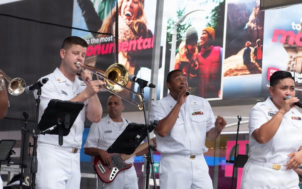 U.S. Navy Band Cruisers perform on Times Square for the International Naval Review.