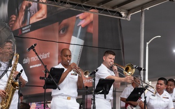 U.S. Navy Band Cruisers perform on Times Square for the International Naval Review.