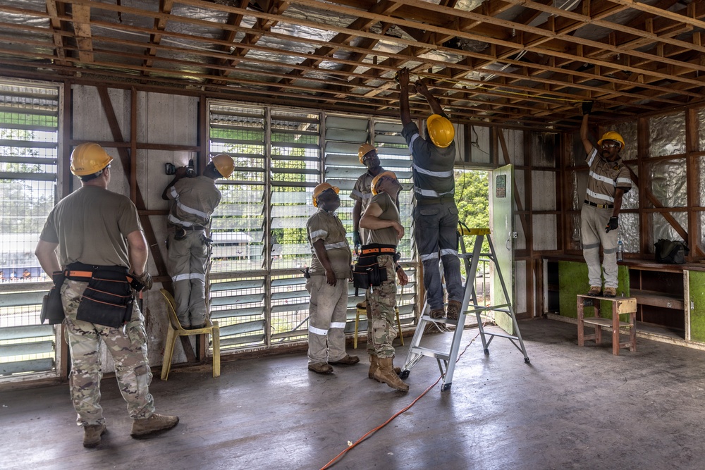 U.S., Papua New Guinea engineers prepare Igam Barracks classrooms for renovation during Tamiok Strike 26