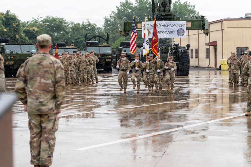 Color Guard members march off during the 25th Transportation Battalion Change of Command Ceremony.