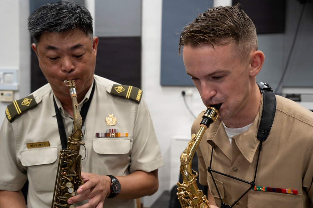 U.S. Marine band practices alongside the Singapore Armed Forces Band