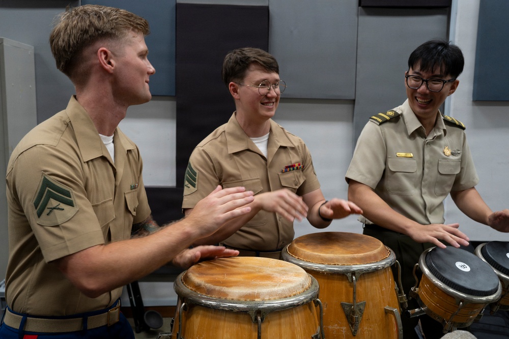 U.S. Marine band practices alongside the Singapore Armed Forces Band