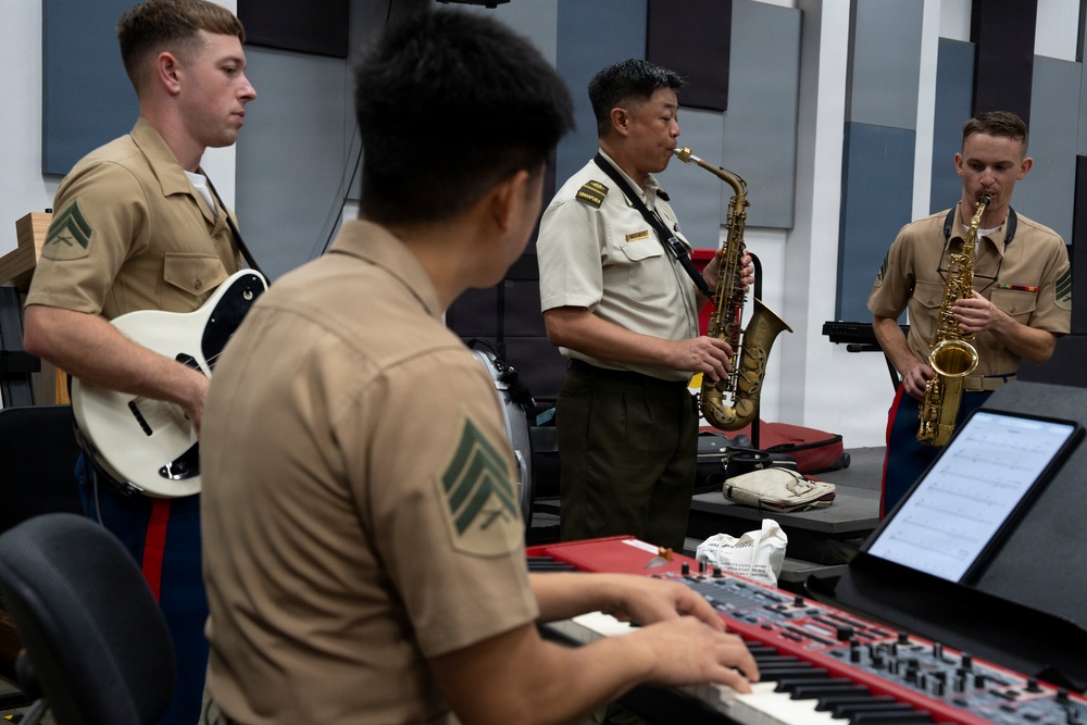 U.S. Marine band practices alongside the Singapore Armed Forces Band