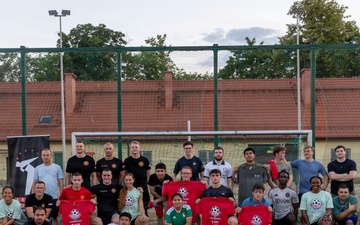 U.S. Army and NATO Soldiers participate in the Heat Wave All-Star Soccer clinic