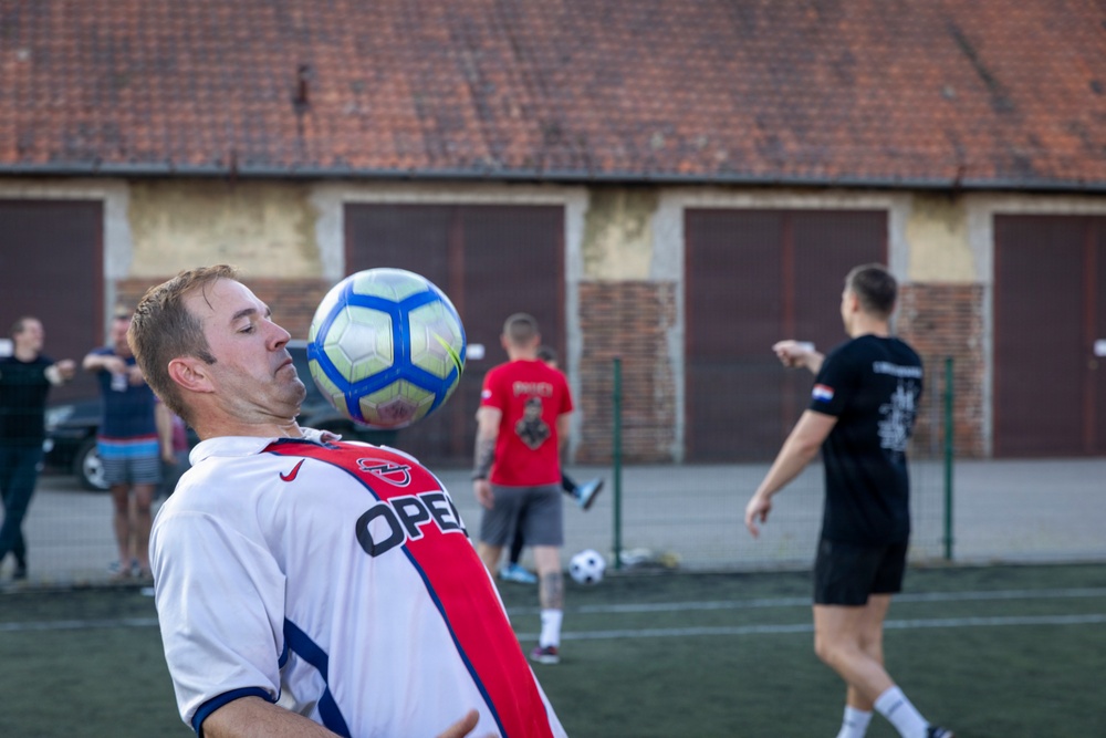 U.S. Army and NATO Soldiers participate in Heat Wave All-Star Soccer clinic