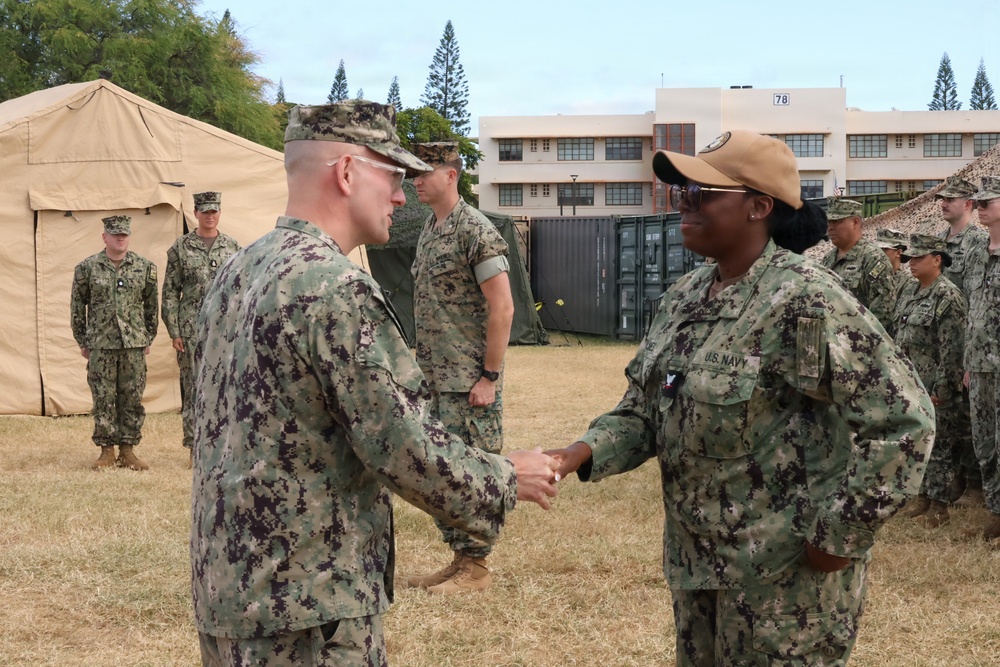 First Naval Construction Regiment Holds Promotion Ceremony For Sailor