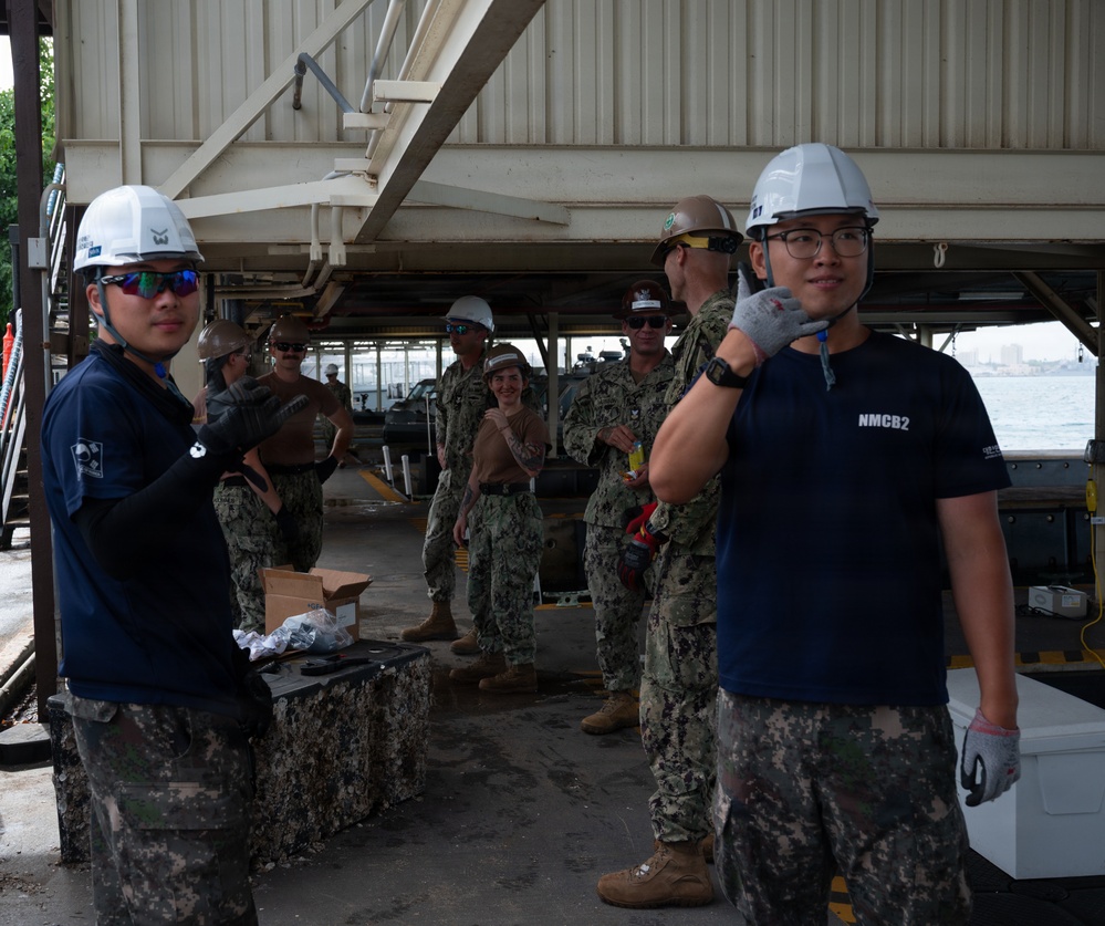 ROK Navy Sailors, U.S. Navy Seabees replace 1,300 feet of Pearl Harbor waterline during RIMPAC 2026