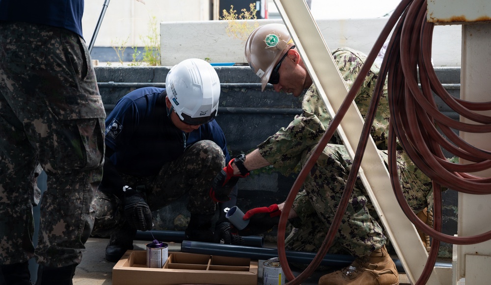 ROK Navy Sailors, U.S. Navy Seabees replace 1,300 feet of Pearl Harbor waterline during RIMPAC 2026