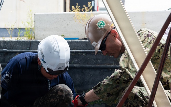 ROK Navy Sailors, U.S. Navy Seabees replace 1,300 feet of Pearl Harbor waterline during RIMPAC 2026