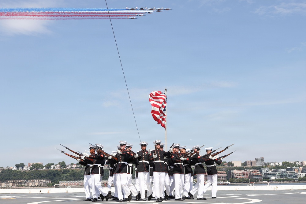 U.S. Marine Corps Silent Drill Platoon performs on the USS Arlington