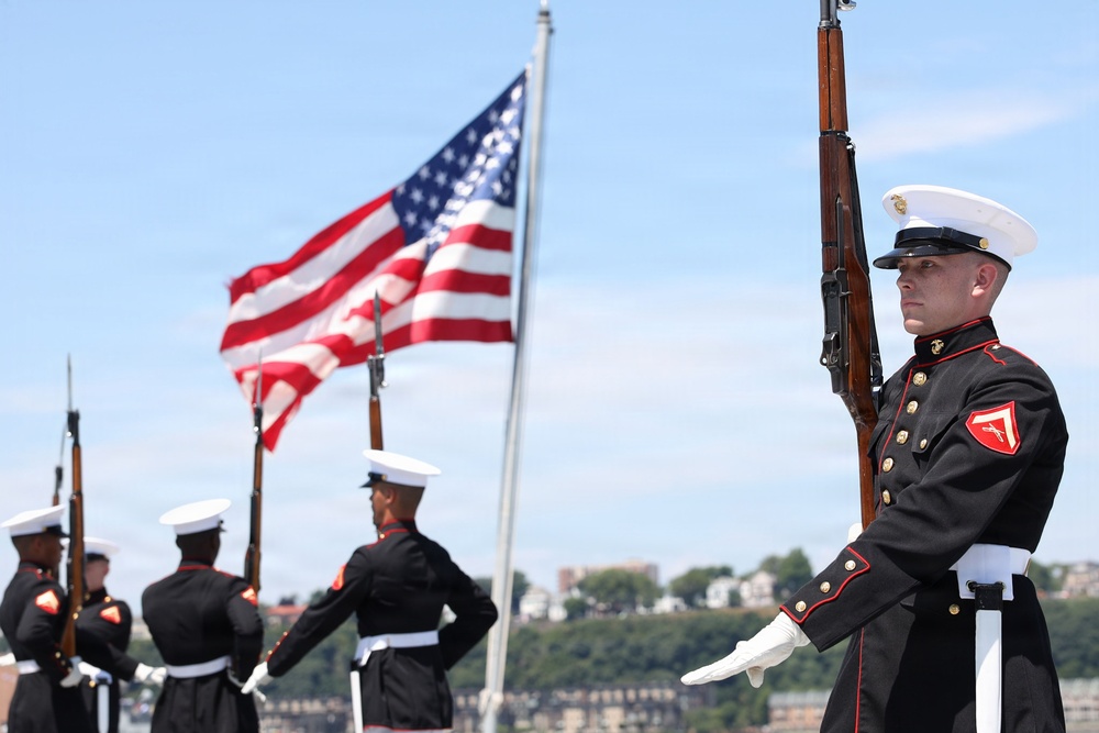 U.S. Marine Corps Silent Drill Platoon performs on the USS Arlington