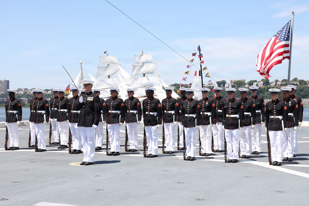 U.S. Marine Corps Silent Drill Platoon performs on the USS Arlington