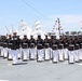 U.S. Marine Corps Silent Drill Platoon performs on the USS Arlington