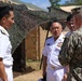 Japanese Maritime Self Defense Force personnel tour the RIMPAC 2026 humanitarian assistance and disaster relief camp
