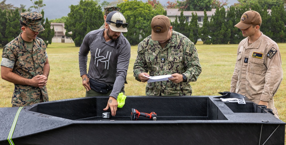 U.S. Sailors, Marines work on 3D printed boat during RIMPAC 26