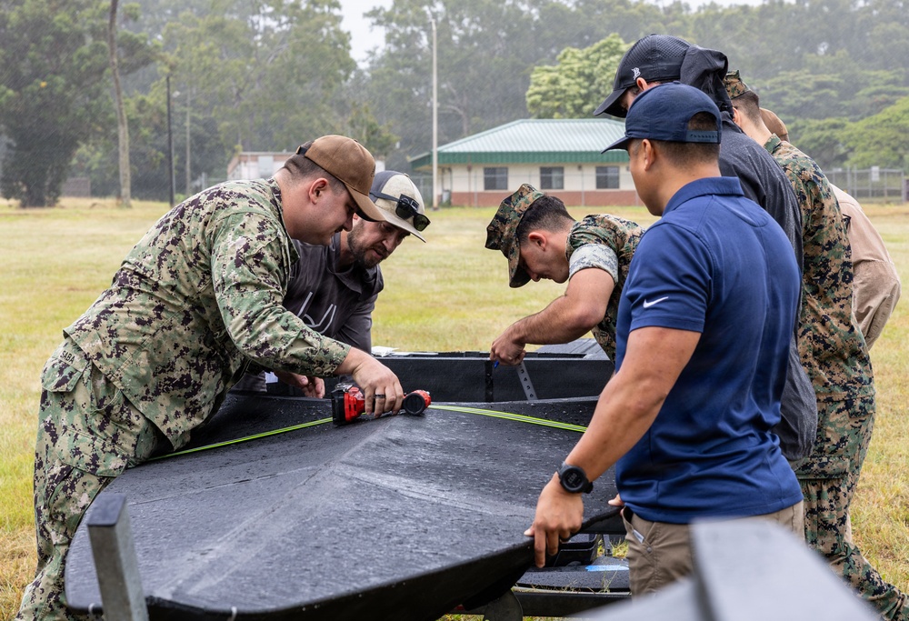 U.S. Sailors, Marines work on 3D printed boat during RIMPAC 26