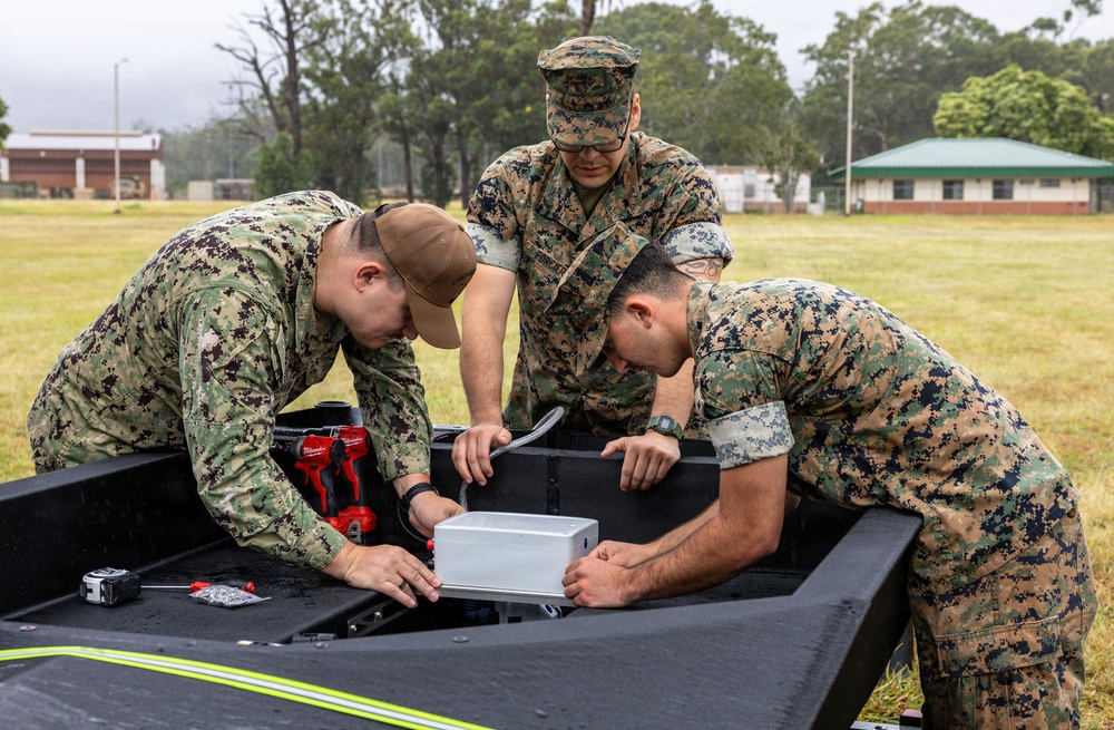 U.S. Sailors, Marines work on 3D printed boat during RIMPAC 26