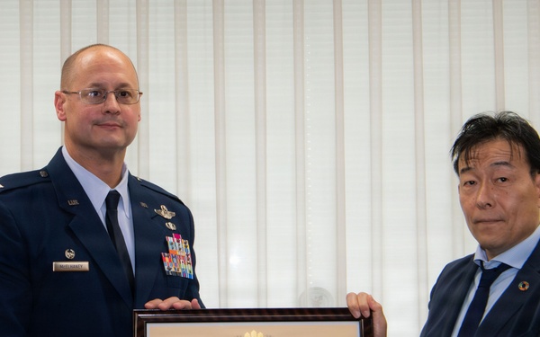 374th AW commander visits local leaders
